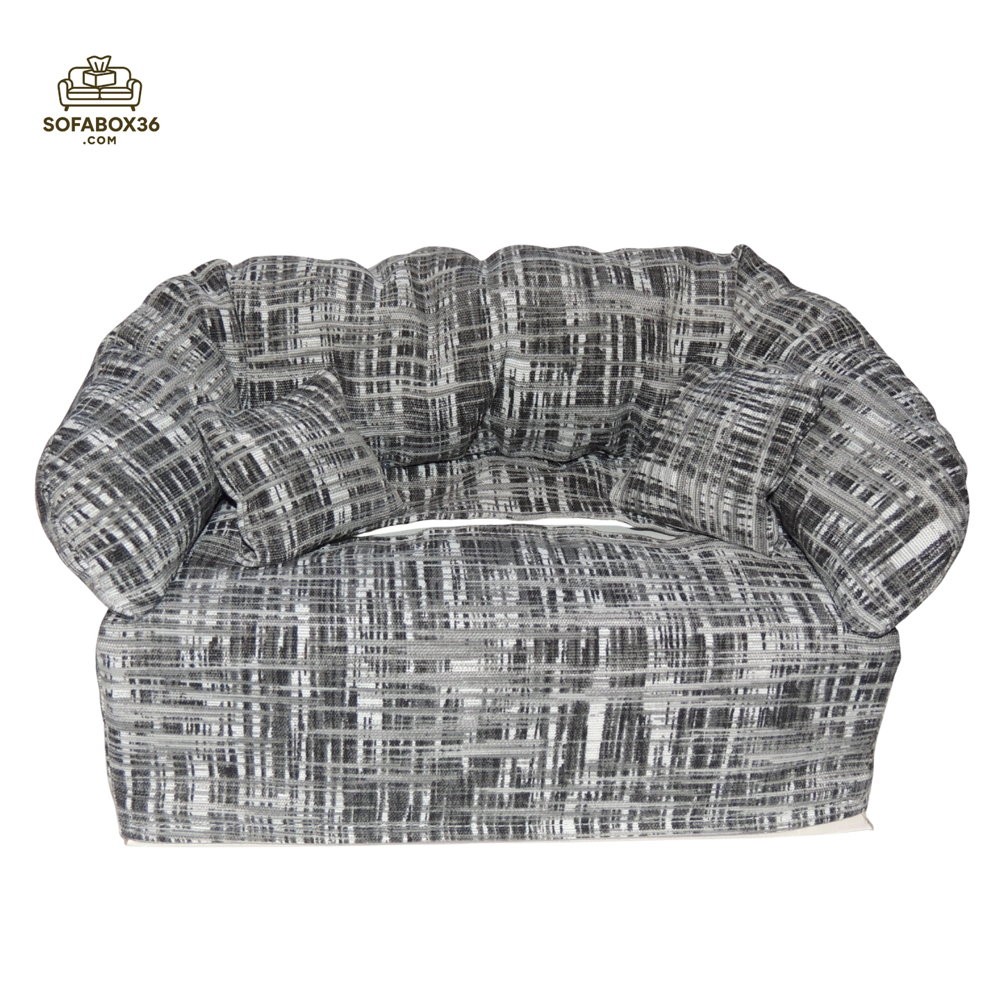 Funda de caja de pañuelos representada como un sofá (blanco y negro).