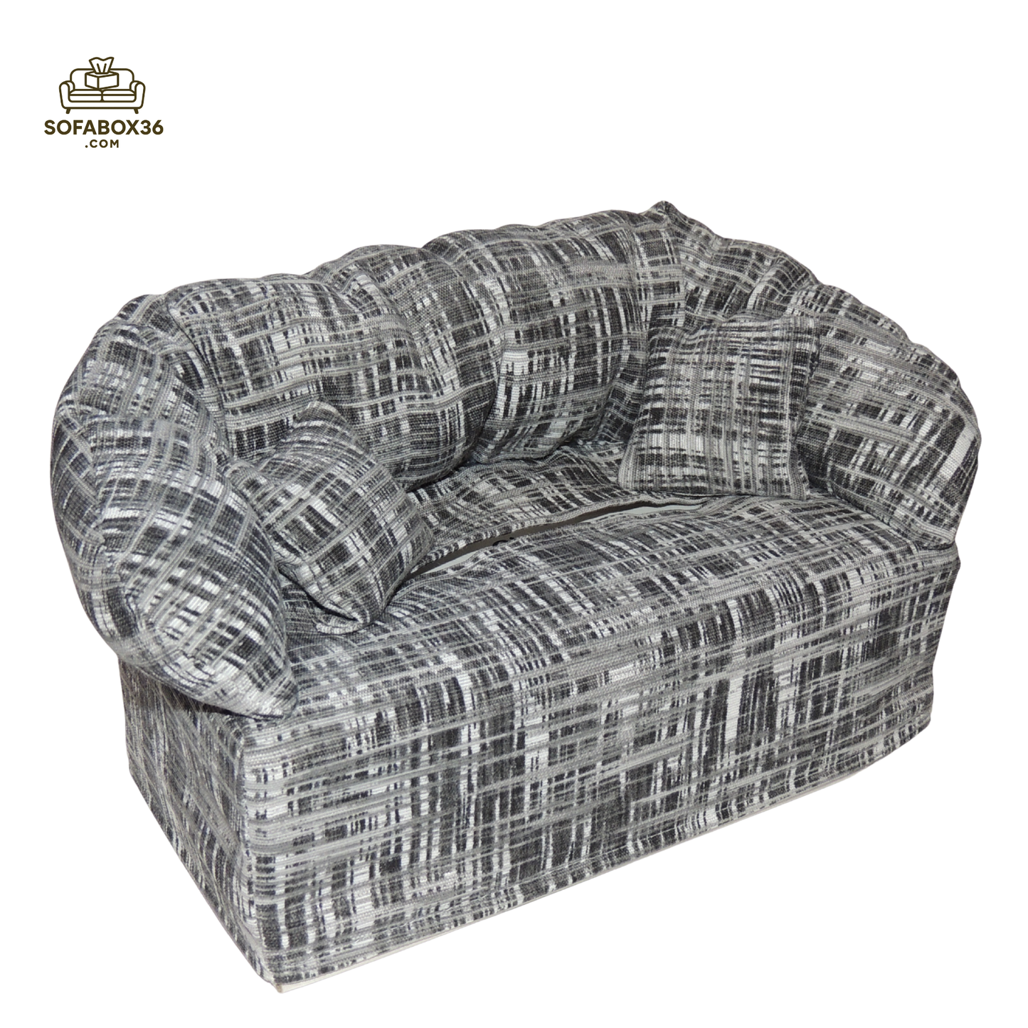Funda de caja de pañuelos representada como un sofá (blanco y negro).